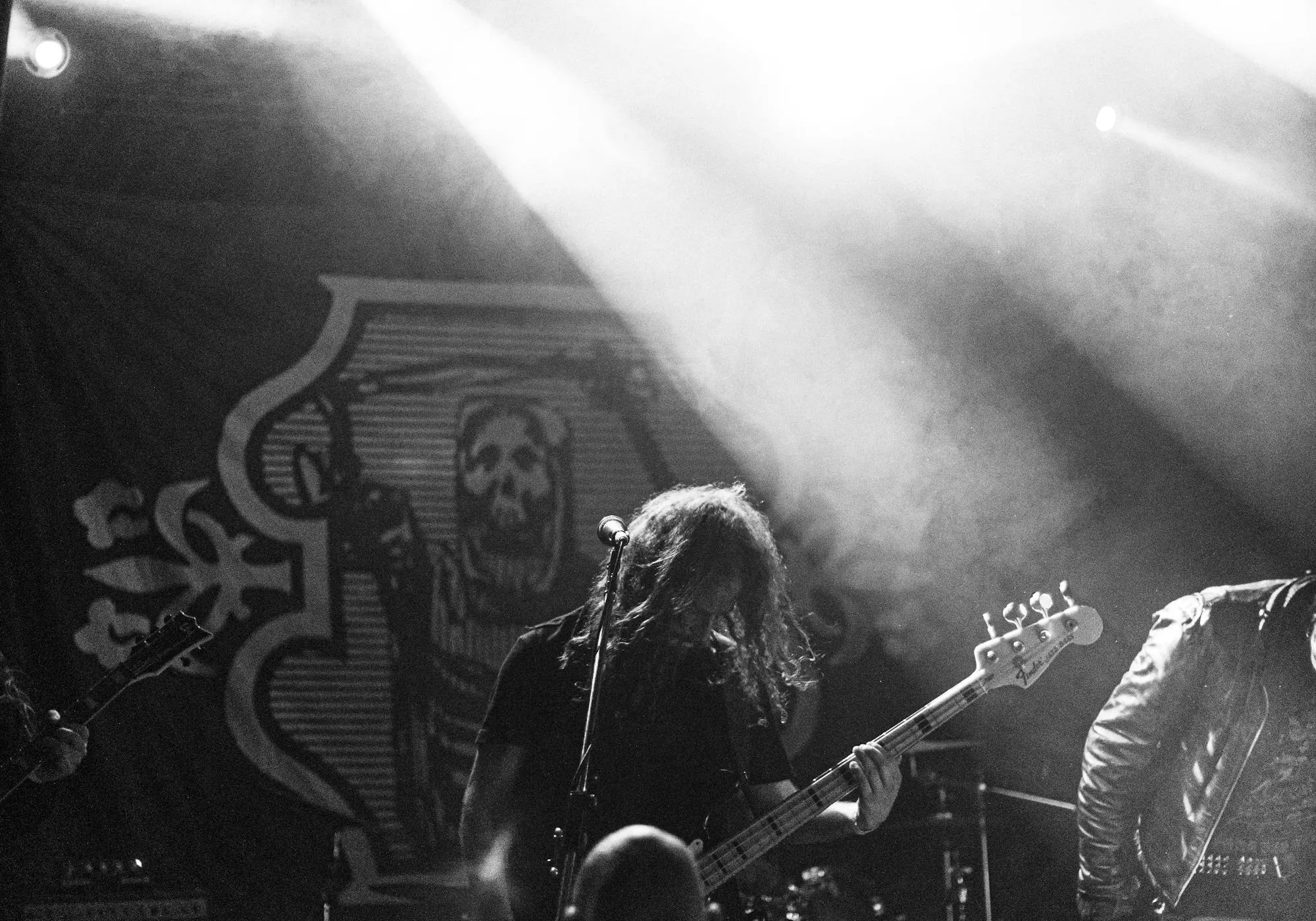 Black and white live band performing on stage