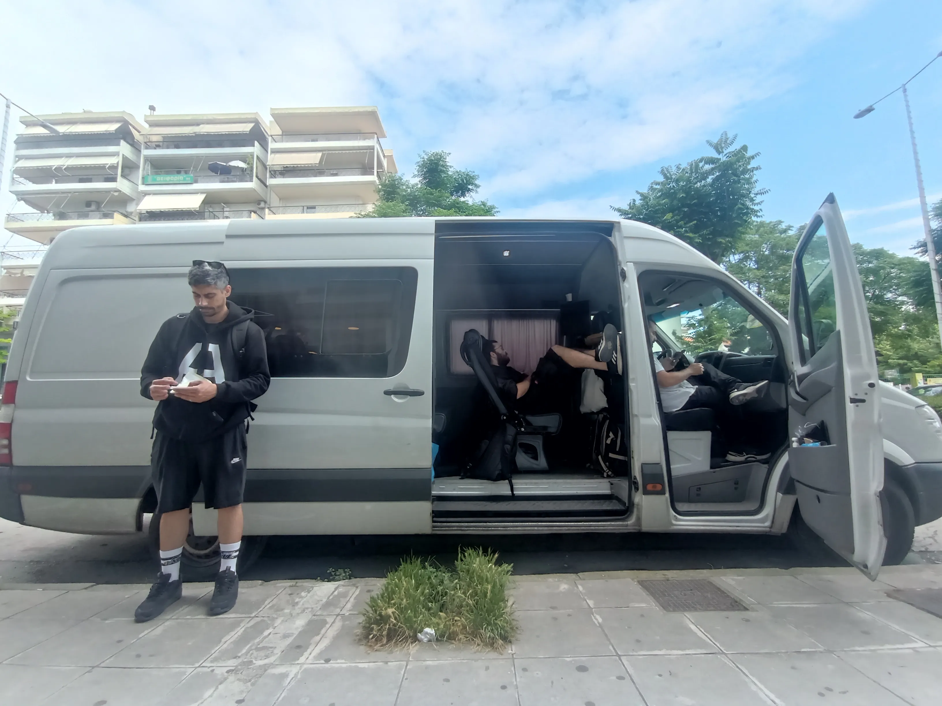 Band members rehearsing together in a studio